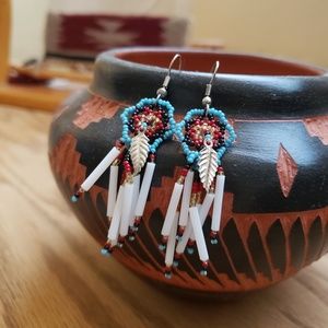 Beaded Earrings With Feather